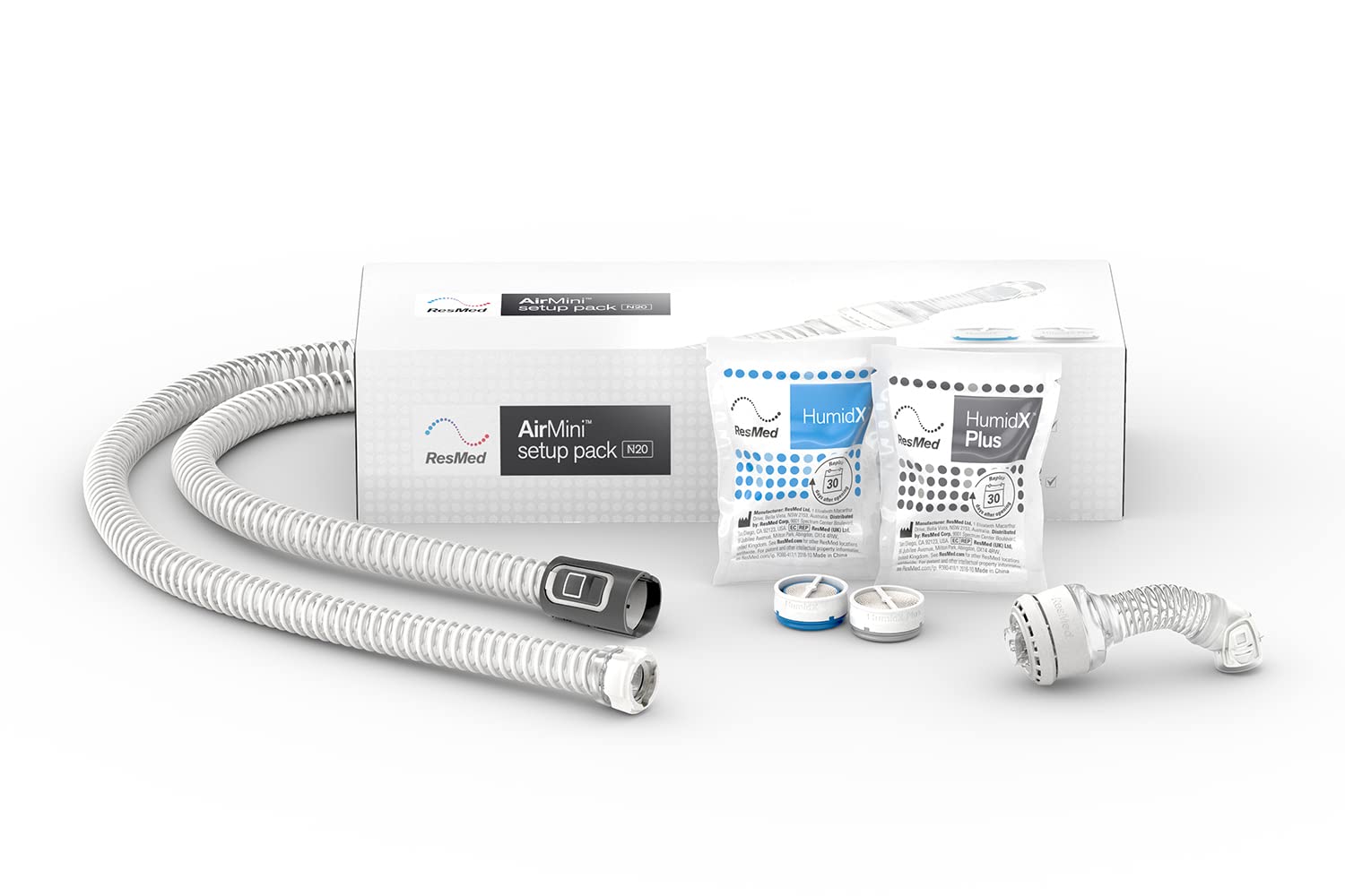 A ResMed Airmini N20 setup pack,  includes a flexible tube, N20 connector, and two waterless humidifiers – HumidX and HumidX Plus.